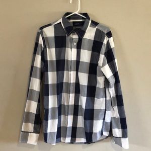 Long sleeve blue dress shirt.